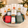 SOCALA Christmas breakfast basket with pancake mix, tea, hot chocolate, cookies, sweets, red and green mugs, two holiday candles and safety matches.