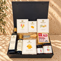 SOCALA gift box with smoked Gouda cheese, Gouda spread, fig jam, tapenade, crackers, Italian olive oil, balsamic, herbs and Gummi Bear Cubs.